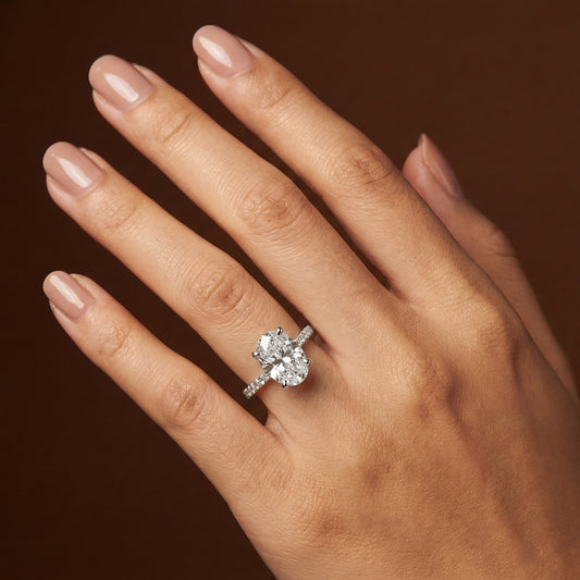 3.28ct Oval Cut Hidden Halo & Diamond Shoulder Engagement Ring - D/E, VVS/VS - IGI - 18ct White Gold